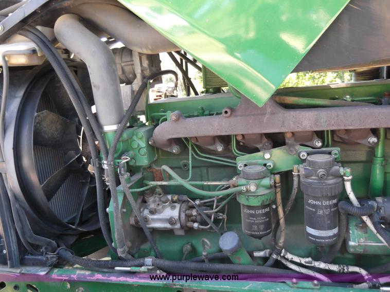 image for item D1650 2006 John Deere 7320 MFWD tractor
