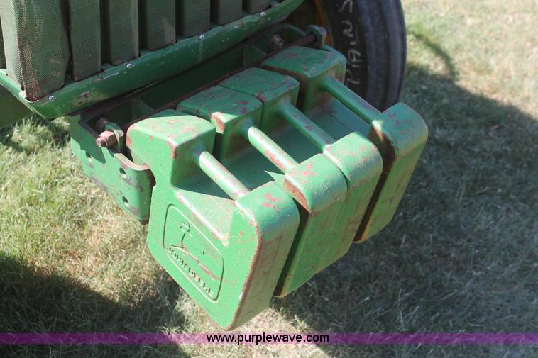 image for item H8152 2002 John Deere 790 tractor