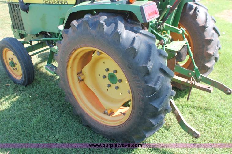 image for item H8152 2002 John Deere 790 tractor