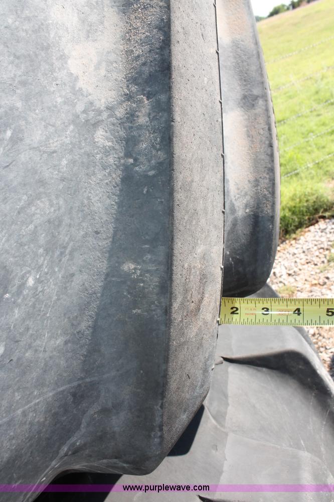 image for item H8171 (2) Firestone 900/60R32 tires and wheels