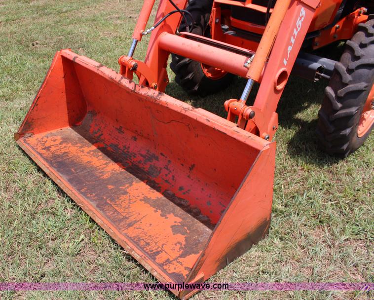 image for item K1014 2006 Kubota M7040 tractor