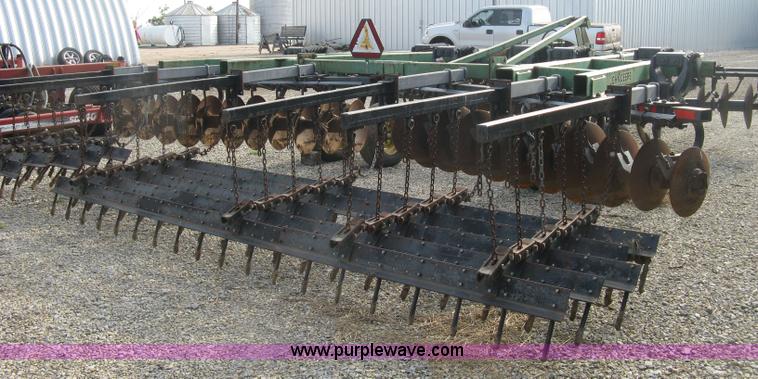 image for item K8731 John Deere 510 disk ripper