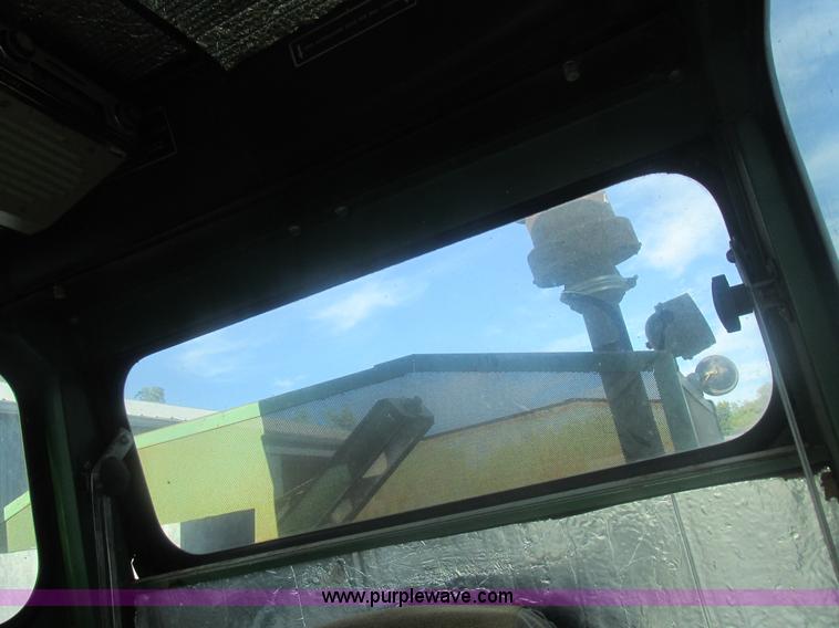 image for item L4027 1976 John Deere 4400 combine