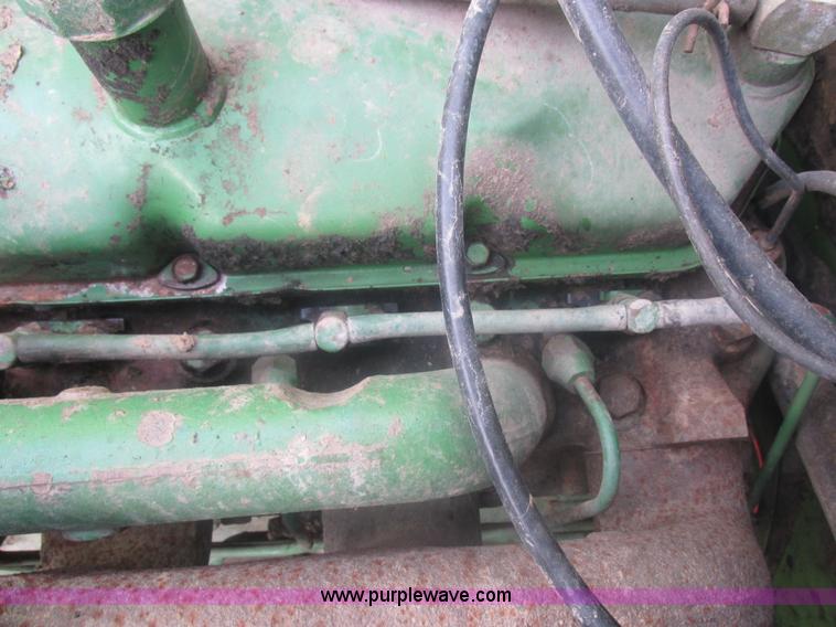 image for item L4027 1976 John Deere 4400 combine