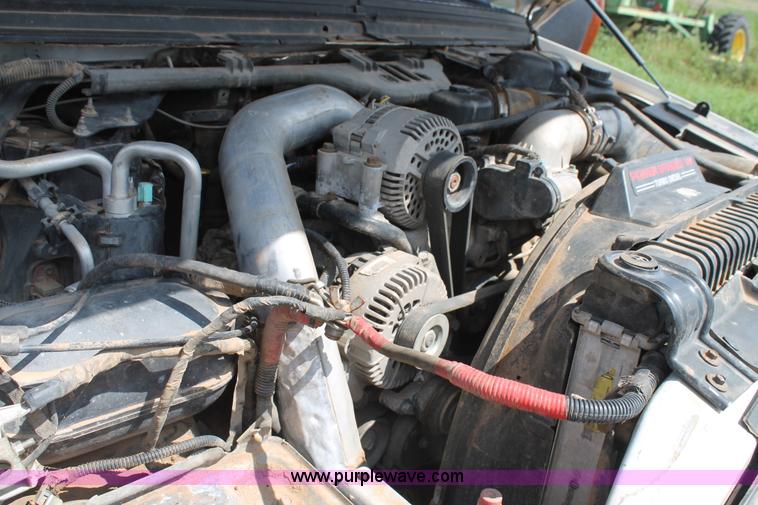 image for item BJ9414 2004 Ford F250 Super Duty Crew Cab pickup truck