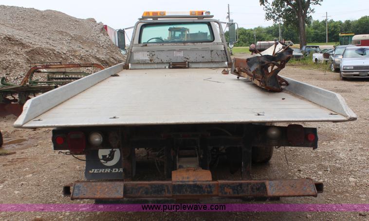 image for item BO9375 1994 Ford F700 rollback truck