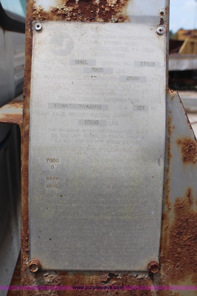 image for item BO9375 1994 Ford F700 rollback truck