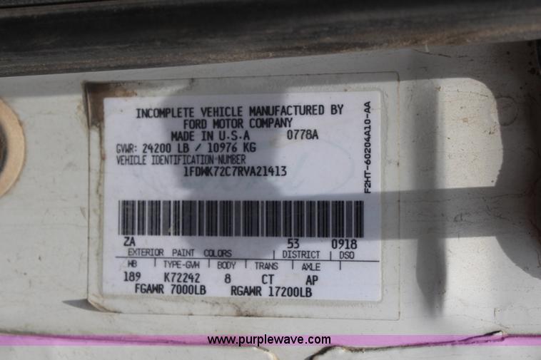 image for item BO9375 1994 Ford F700 rollback truck