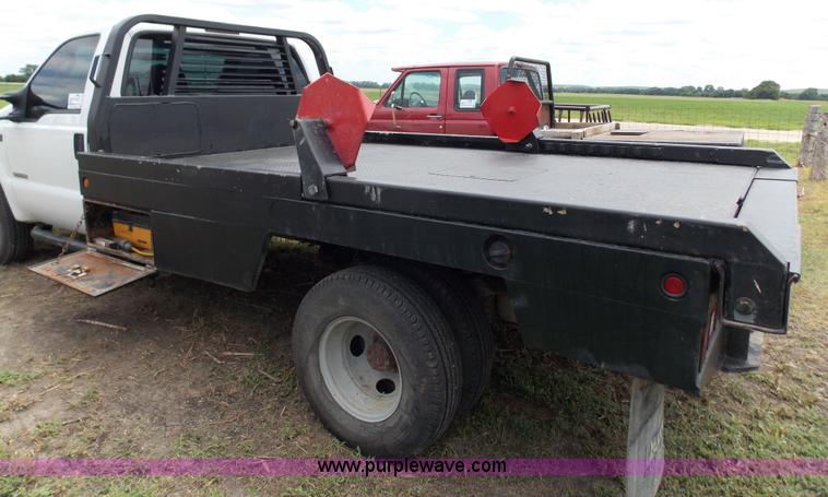 image for item J2748 2003 Ford F350 Super Duty XLT bale bed pickup truck