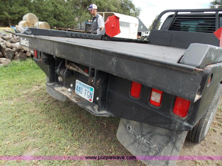 image for item J2748 2003 Ford F350 Super Duty XLT bale bed pickup truck