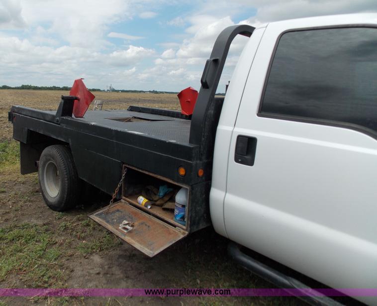 image for item J2748 2003 Ford F350 Super Duty XLT bale bed pickup truck