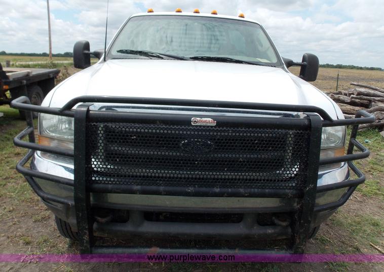 image for item J2748 2003 Ford F350 Super Duty XLT bale bed pickup truck