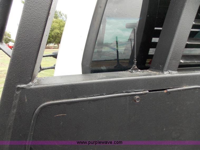 image for item J2748 2003 Ford F350 Super Duty XLT bale bed pickup truck