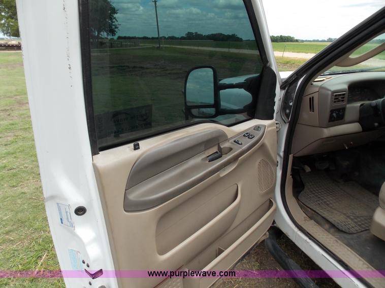 image for item J2748 2003 Ford F350 Super Duty XLT bale bed pickup truck