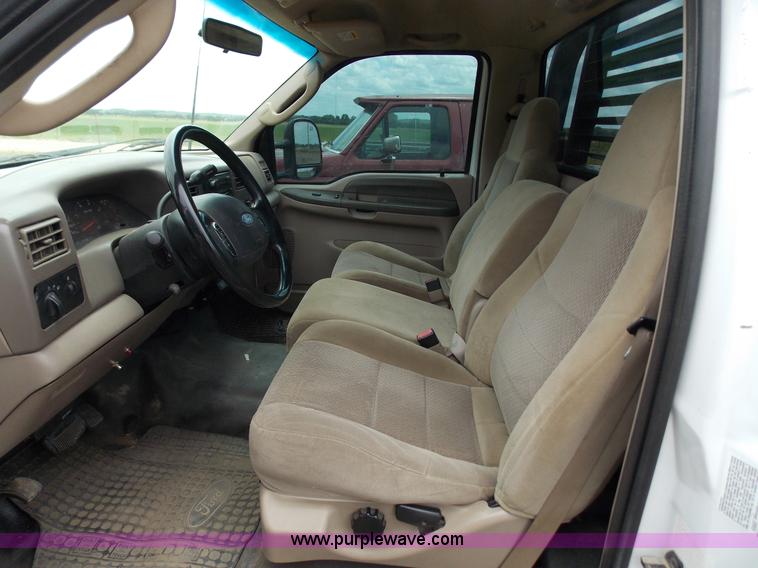 image for item J2748 2003 Ford F350 Super Duty XLT bale bed pickup truck