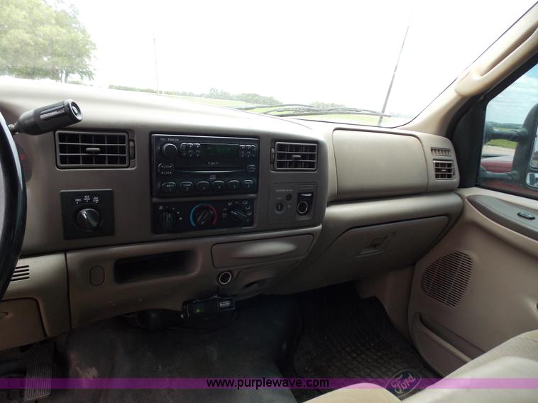 image for item J2748 2003 Ford F350 Super Duty XLT bale bed pickup truck