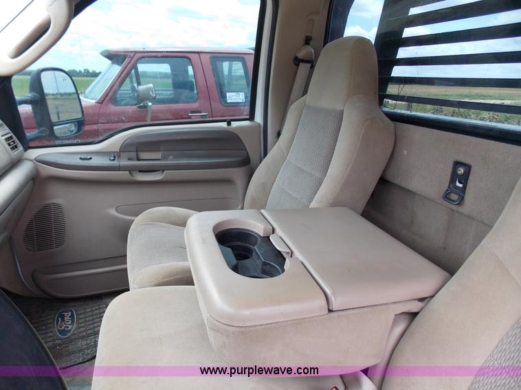 image for item J2748 2003 Ford F350 Super Duty XLT bale bed pickup truck