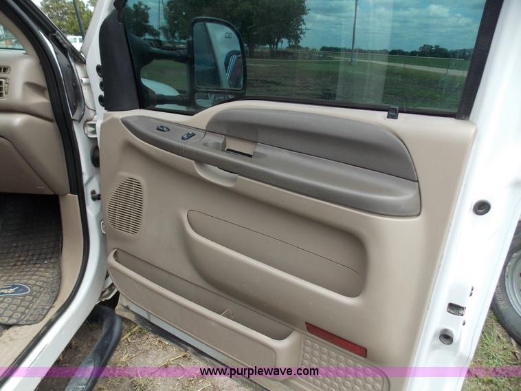 image for item J2748 2003 Ford F350 Super Duty XLT bale bed pickup truck