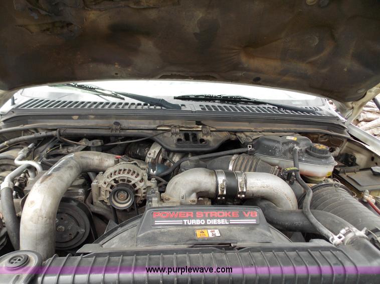 image for item J2748 2003 Ford F350 Super Duty XLT bale bed pickup truck