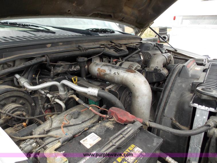 image for item J2748 2003 Ford F350 Super Duty XLT bale bed pickup truck