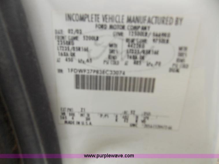 image for item J2748 2003 Ford F350 Super Duty XLT bale bed pickup truck