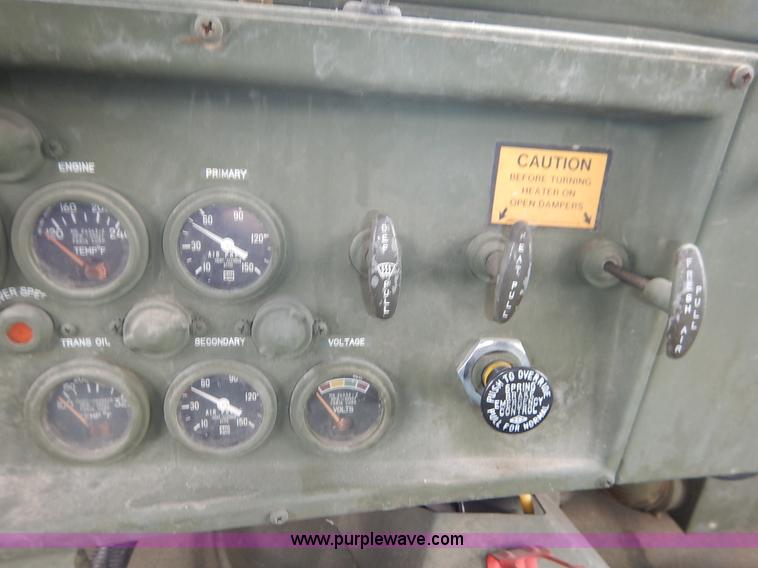 image for item J3882 1990 BMY flatbed truck