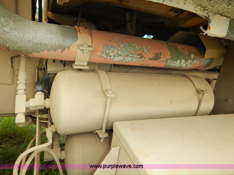 image for item J3882 1990 BMY flatbed truck