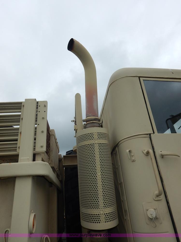 image for item J3882 1990 BMY flatbed truck