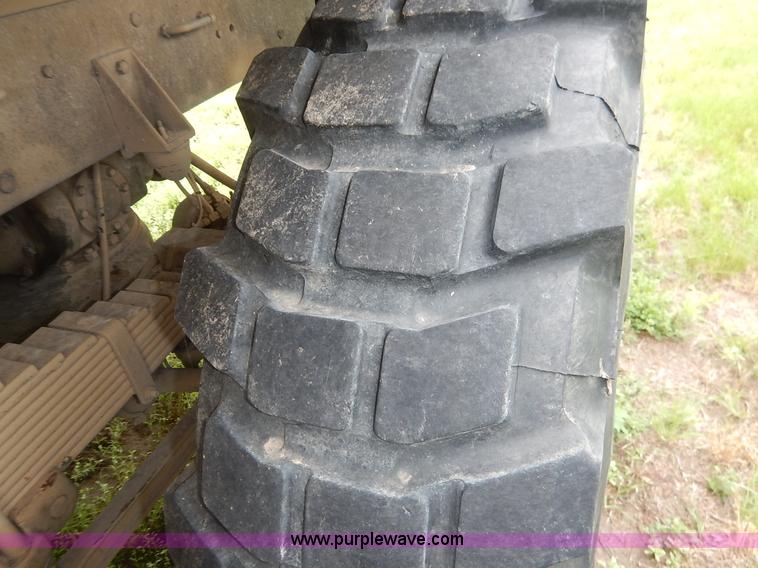 image for item J3882 1990 BMY flatbed truck