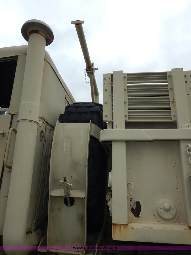 image for item J3882 1990 BMY flatbed truck