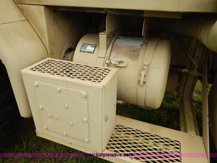 image for item J3882 1990 BMY flatbed truck