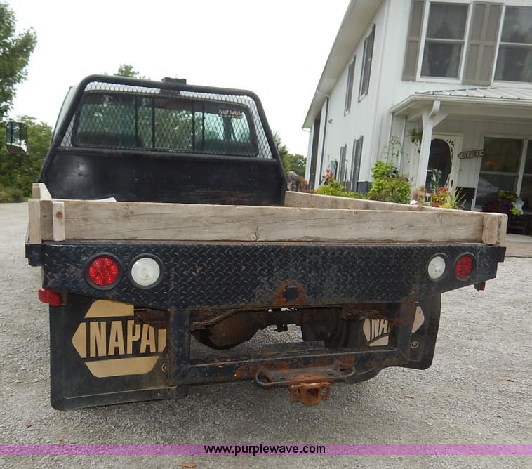 image for item K1538 1988 Ford F250 XLT Lariat flatbed pickup truck