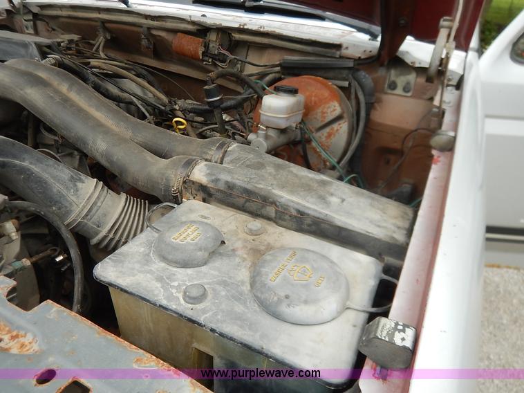 image for item K1538 1988 Ford F250 XLT Lariat flatbed pickup truck