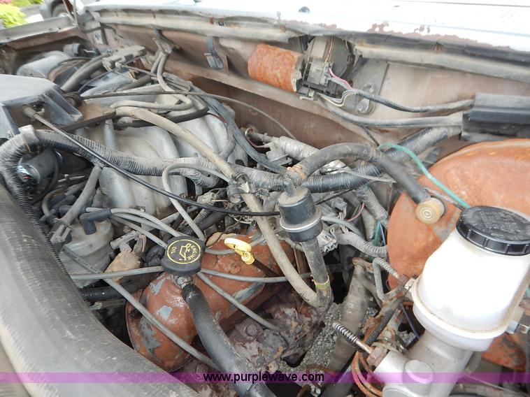 image for item K1538 1988 Ford F250 XLT Lariat flatbed pickup truck