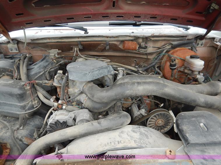 image for item K1538 1988 Ford F250 XLT Lariat flatbed pickup truck