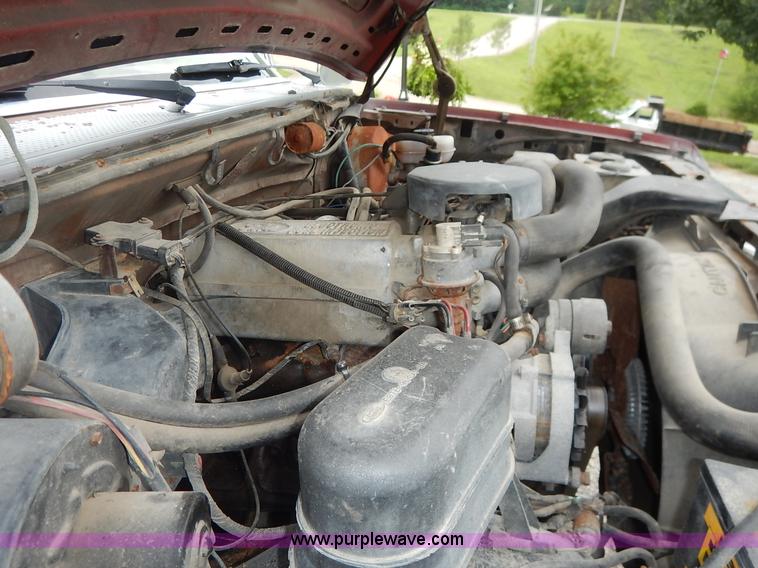 image for item K1538 1988 Ford F250 XLT Lariat flatbed pickup truck