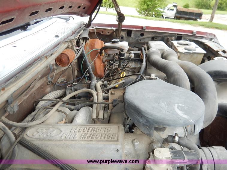 image for item K1538 1988 Ford F250 XLT Lariat flatbed pickup truck