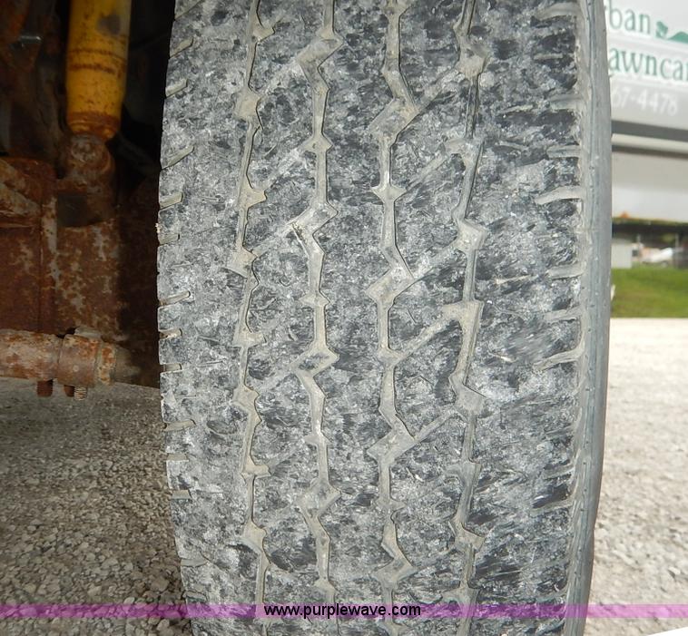 image for item K1538 1988 Ford F250 XLT Lariat flatbed pickup truck