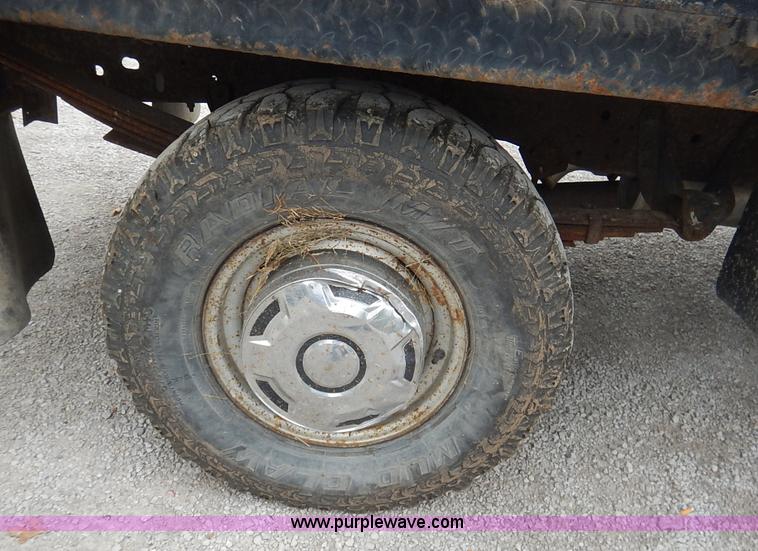 image for item K1538 1988 Ford F250 XLT Lariat flatbed pickup truck