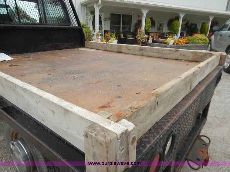 image for item K1538 1988 Ford F250 XLT Lariat flatbed pickup truck