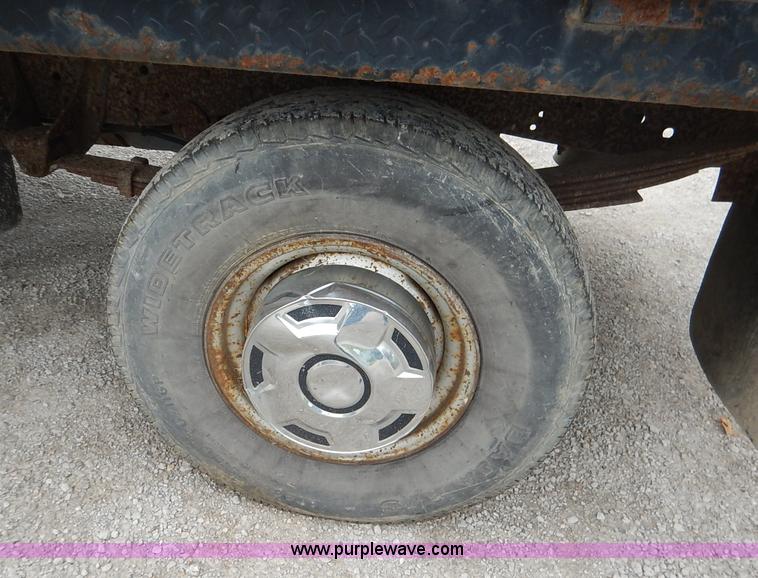 image for item K1538 1988 Ford F250 XLT Lariat flatbed pickup truck