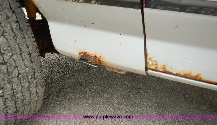 image for item K1538 1988 Ford F250 XLT Lariat flatbed pickup truck