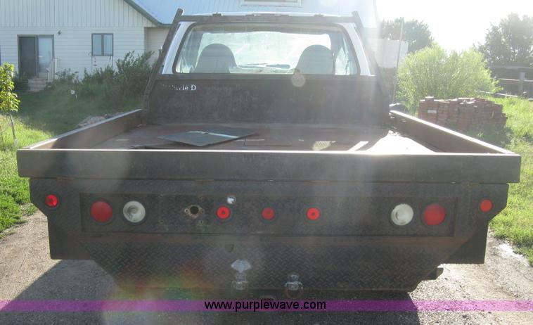 image for item K8719 2000 Ford F250 Super Duty XL flatbed pickup truck