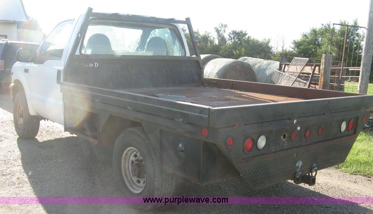 image for item K8719 2000 Ford F250 Super Duty XL flatbed pickup truck