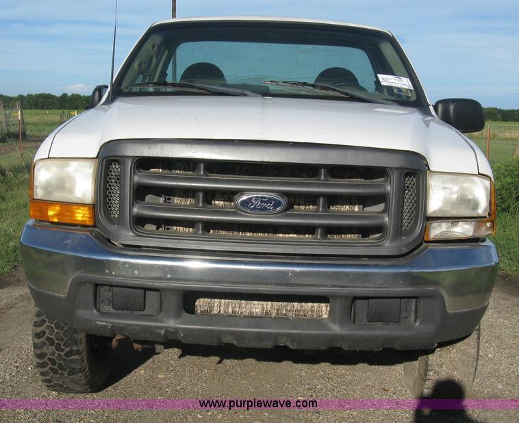 image for item K8719 2000 Ford F250 Super Duty XL flatbed pickup truck