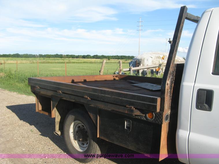 image for item K8719 2000 Ford F250 Super Duty XL flatbed pickup truck