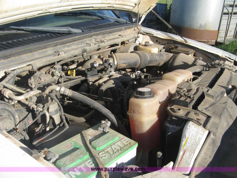 image for item K8719 2000 Ford F250 Super Duty XL flatbed pickup truck