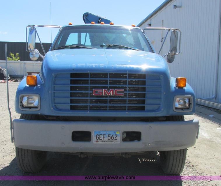 image for item A8848 1999 GMC C7500 flatbed truck with crane