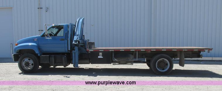 image for item A8848 1999 GMC C7500 flatbed truck with crane