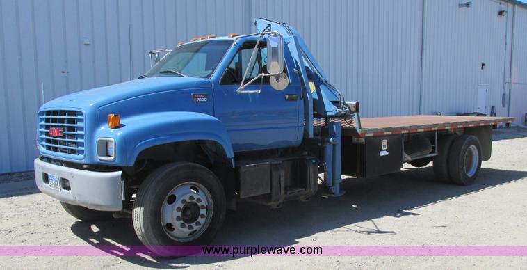 image for item A8848 1999 GMC C7500 flatbed truck with crane